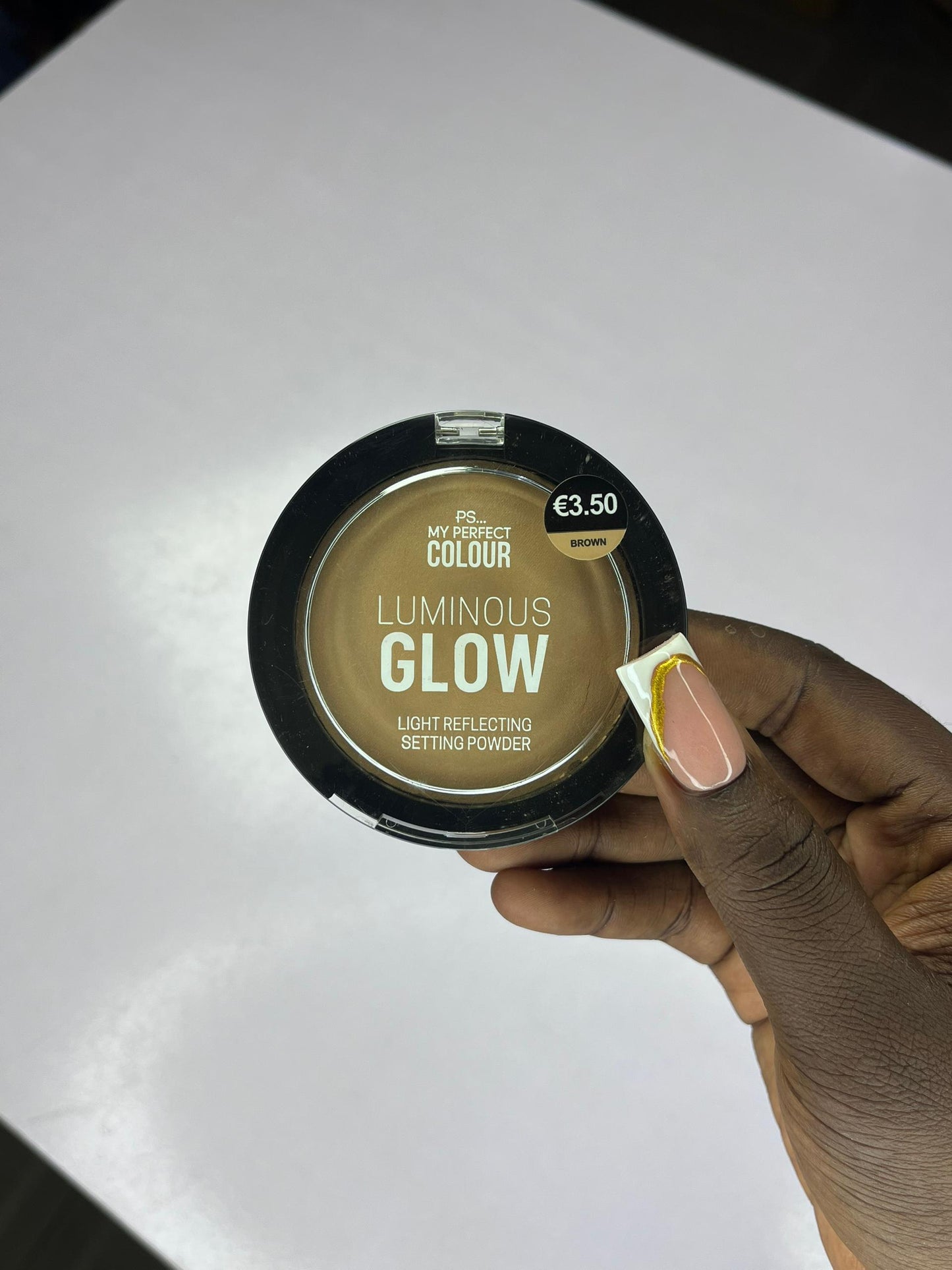 Poudre compacte lumineuse